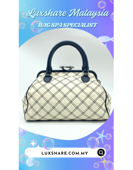 MARC JACOBS HANDLE HANDBAG IN BLACK AND WHITE''LEATHER TREATMENT AND BAG SPA SERVICE''