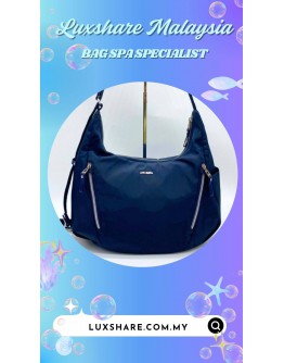 PACSAFE STYLESAFE ANTI-THEFT CONVERTIBLE CROSSBODY BAG IN BLUE (BAG SPA CLEANING,TREATMENT AND CARE)
