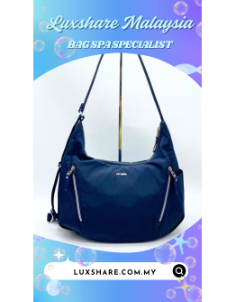 PAC SAFE CROSSBODY BAG IN NAVY BLUE"DEEP CLEANING AND BAG SPA SERVICE"