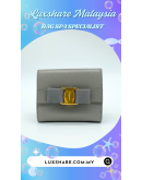 SALVATORE FERRAGAMO VARA BOW COIN PURSE IN GREY " BAG SPA SERVICE AND TREATMENT LEATHER"